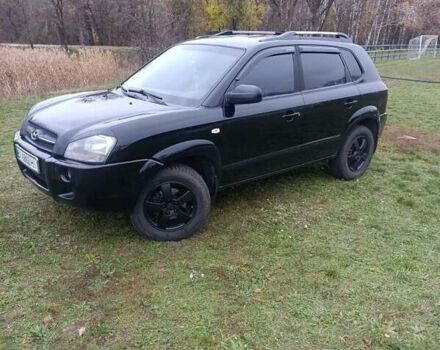 Черный Хендай Туксон, объемом двигателя 2 л и пробегом 220 тыс. км за 8300 $, фото 7 на Automoto.ua