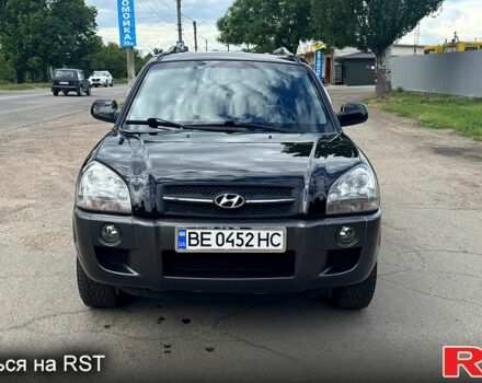 Черный Хендай Туксон, объемом двигателя 2 л и пробегом 192 тыс. км за 7700 $, фото 1 на Automoto.ua