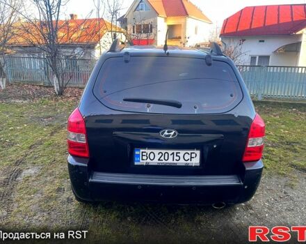 Черный Хендай Туксон, объемом двигателя 2 л и пробегом 227 тыс. км за 8000 $, фото 2 на Automoto.ua