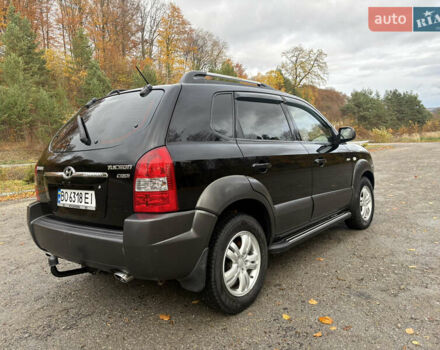 Хендай Туксон 2006 у Тернополі на Automoto.ua Чорний Хендай Туксон, об'ємом двигуна 1.99 л та пробігом 240 тис. км за 7600 $, фото 21 на Automoto.ua