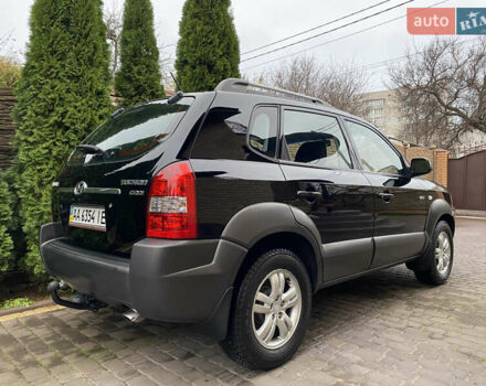 Черный Хендай Туксон, объемом двигателя 1.99 л и пробегом 186 тыс. км за 9400 $, фото 8 на Automoto.ua