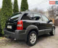 Черный Хендай Туксон, объемом двигателя 1.99 л и пробегом 186 тыс. км за 9400 $, фото 8 на Automoto.ua