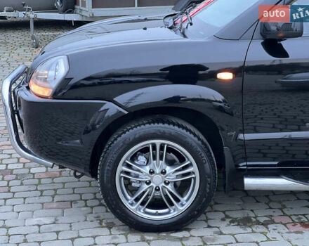 Чорний Хендай Туксон, об'ємом двигуна 1.98 л та пробігом 170 тис. км за 6999 $, фото 10 на Automoto.ua