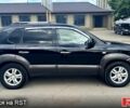 Черный Хендай Туксон, объемом двигателя 2 л и пробегом 192 тыс. км за 7700 $, фото 4 на Automoto.ua