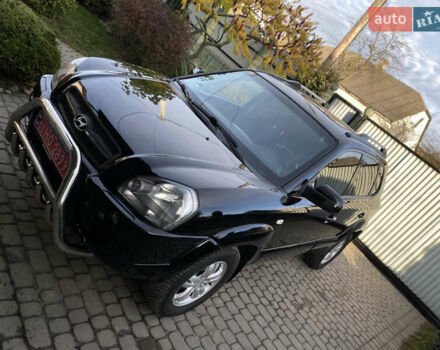 Чорний Хендай Туксон, об'ємом двигуна 1.98 л та пробігом 233 тис. км за 7650 $, фото 1 на Automoto.ua