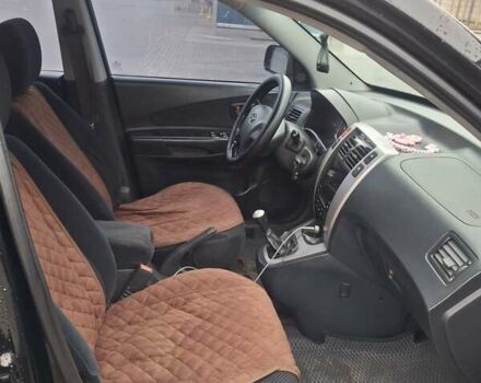 Чорний Хендай Туксон, об'ємом двигуна 2 л та пробігом 270 тис. км за 7500 $, фото 9 на Automoto.ua