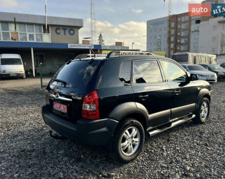 Черный Хендай Туксон, объемом двигателя 1.98 л и пробегом 191 тыс. км за 8300 $, фото 5 на Automoto.ua
