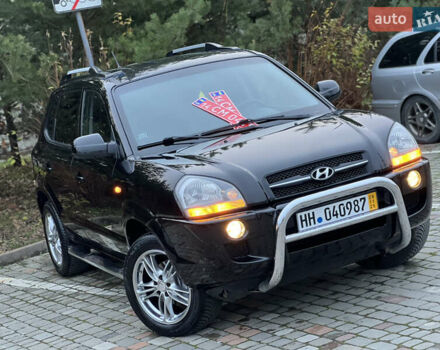 Чорний Хендай Туксон, об'ємом двигуна 1.98 л та пробігом 170 тис. км за 6999 $, фото 6 на Automoto.ua