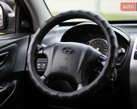 Черный Хендай Туксон, объемом двигателя 2.66 л и пробегом 217 тыс. км за 8600 $, фото 13 на Automoto.ua