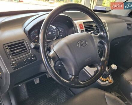 Чорний Хендай Туксон, об'ємом двигуна 1.98 л та пробігом 226 тис. км за 8800 $, фото 24 на Automoto.ua