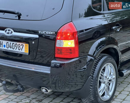 Чорний Хендай Туксон, об'ємом двигуна 1.98 л та пробігом 170 тис. км за 6999 $, фото 45 на Automoto.ua