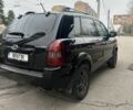 Черный Хендай Туксон, объемом двигателя 2 л и пробегом 174 тыс. км за 8000 $, фото 2 на Automoto.ua