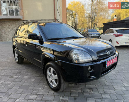 Черный Хендай Туксон, объемом двигателя 2 л и пробегом 249 тыс. км за 7450 $, фото 6 на Automoto.ua