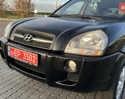 Черный Хендай Туксон, объемом двигателя 1.98 л и пробегом 243 тыс. км за 8500 $, фото 6 на Automoto.ua