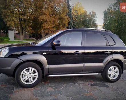 Черный Хендай Туксон, объемом двигателя 2 л и пробегом 230 тыс. км за 8600 $, фото 98 на Automoto.ua