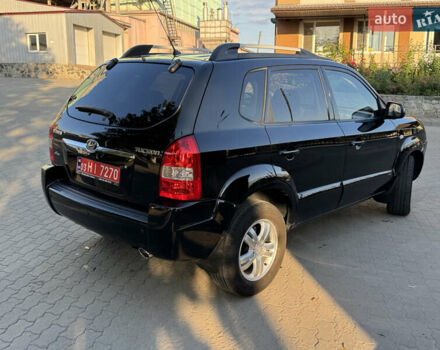 Чорний Хендай Туксон, об'ємом двигуна 2 л та пробігом 180 тис. км за 7800 $, фото 12 на Automoto.ua