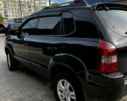 Чорний Хендай Туксон, об'ємом двигуна 2 л та пробігом 253 тис. км за 9428 $, фото 3 на Automoto.ua