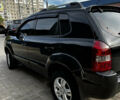 Чорний Хендай Туксон, об'ємом двигуна 2 л та пробігом 253 тис. км за 9428 $, фото 3 на Automoto.ua