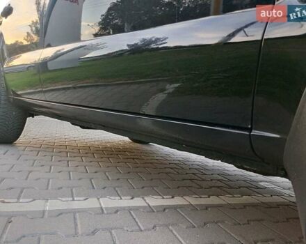 Чорний Хендай Туксон, об'ємом двигуна 1.98 л та пробігом 192 тис. км за 7950 $, фото 12 на Automoto.ua