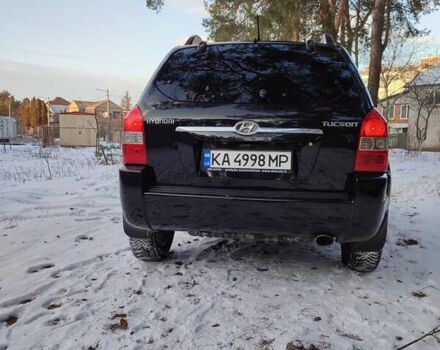 Черный Хендай Туксон, объемом двигателя 1.98 л и пробегом 335 тыс. км за 7800 $, фото 16 на Automoto.ua