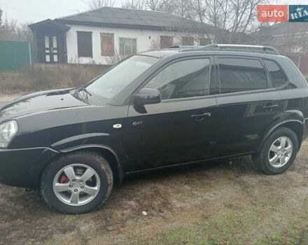 Черный Хендай Туксон, объемом двигателя 1.99 л и пробегом 235 тыс. км за 9000 $, фото 5 на Automoto.ua