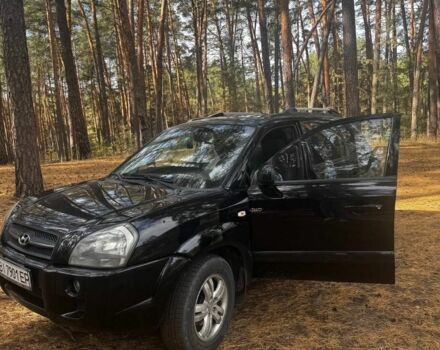 Черный Хендай Туксон, объемом двигателя 2 л и пробегом 240 тыс. км за 8800 $, фото 6 на Automoto.ua