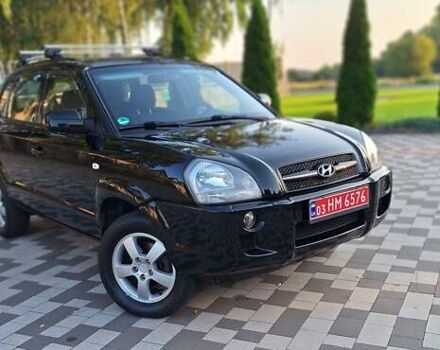 Черный Хендай Туксон, объемом двигателя 2 л и пробегом 190 тыс. км за 8150 $, фото 21 на Automoto.ua