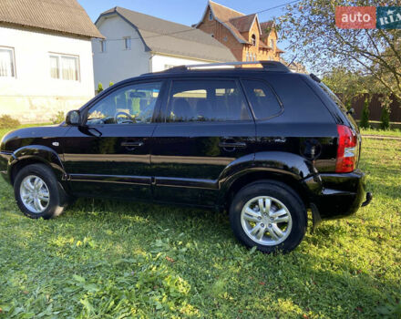 Черный Хендай Туксон, объемом двигателя 1.98 л и пробегом 197 тыс. км за 8000 $, фото 16 на Automoto.ua