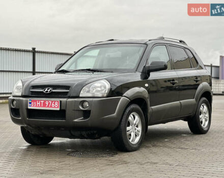 Чорний Хендай Туксон, об'ємом двигуна 2 л та пробігом 230 тис. км за 6850 $, фото 3 на Automoto.ua