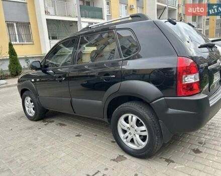 Черный Хендай Туксон, объемом двигателя 1.98 л и пробегом 147 тыс. км за 8000 $, фото 7 на Automoto.ua