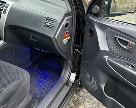 Чорний Хендай Туксон, об'ємом двигуна 1.98 л та пробігом 155 тис. км за 8750 $, фото 12 на Automoto.ua