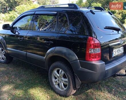 Черный Хендай Туксон, объемом двигателя 1.98 л и пробегом 201 тыс. км за 8800 $, фото 8 на Automoto.ua