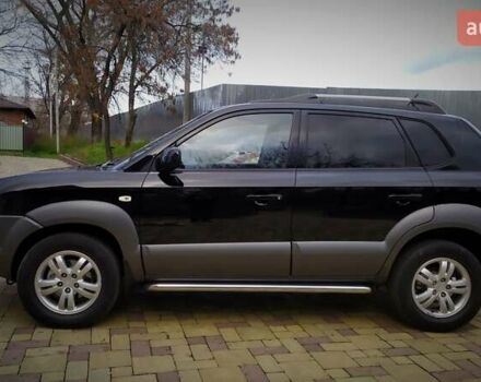 Чорний Хендай Туксон, об'ємом двигуна 2 л та пробігом 229 тис. км за 8600 $, фото 29 на Automoto.ua