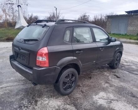 Черный Хендай Туксон, объемом двигателя 2 л и пробегом 280 тыс. км за 3500 $, фото 3 на Automoto.ua