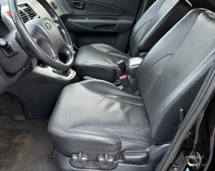 Черный Хендай Туксон, объемом двигателя 1.98 л и пробегом 159 тыс. км за 7600 $, фото 22 на Automoto.ua