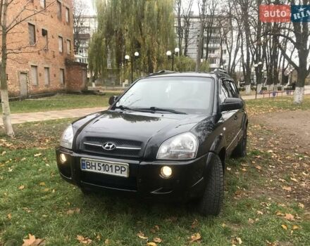 Черный Хендай Туксон, объемом двигателя 2 л и пробегом 210 тыс. км за 8999 $, фото 10 на Automoto.ua