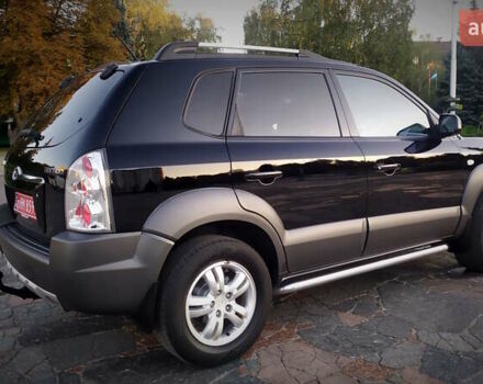 Черный Хендай Туксон, объемом двигателя 2 л и пробегом 230 тыс. км за 8600 $, фото 109 на Automoto.ua