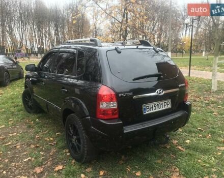 Черный Хендай Туксон, объемом двигателя 2 л и пробегом 210 тыс. км за 8999 $, фото 30 на Automoto.ua