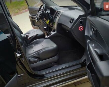 Чорний Хендай Туксон, об'ємом двигуна 2 л та пробігом 229 тис. км за 8600 $, фото 109 на Automoto.ua