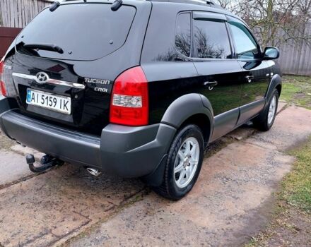 Черный Хендай Туксон, объемом двигателя 2 л и пробегом 272 тыс. км за 7500 $, фото 3 на Automoto.ua