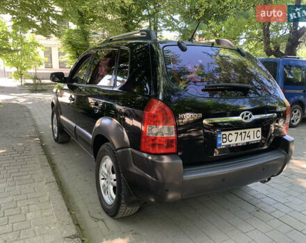 Черный Хендай Туксон, объемом двигателя 1.98 л и пробегом 232 тыс. км за 9100 $, фото 10 на Automoto.ua