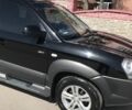 Чорний Хендай Туксон, об'ємом двигуна 2 л та пробігом 150 тис. км за 8100 $, фото 6 на Automoto.ua