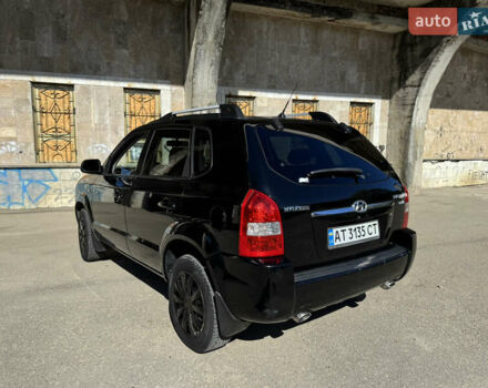 Черный Хендай Туксон, объемом двигателя 2 л и пробегом 189 тыс. км за 8250 $, фото 20 на Automoto.ua