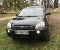 Черный Хендай Туксон, объемом двигателя 2 л и пробегом 210 тыс. км за 8999 $, фото 5 на Automoto.ua