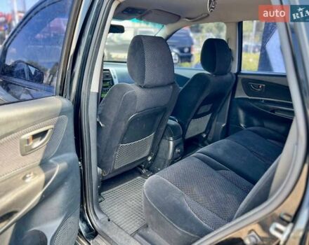 Черный Хендай Туксон, объемом двигателя 2 л и пробегом 227 тыс. км за 8200 $, фото 15 на Automoto.ua