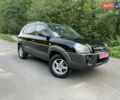 Черный Хендай Туксон, объемом двигателя 2 л и пробегом 174 тыс. км за 7600 $, фото 1 на Automoto.ua