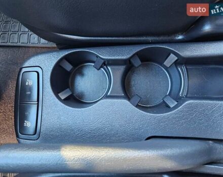 Чорний Хендай Туксон, об'ємом двигуна 2 л та пробігом 152 тис. км за 7950 $, фото 21 на Automoto.ua