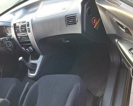 Черный Хендай Туксон, объемом двигателя 2 л и пробегом 190 тыс. км за 8150 $, фото 29 на Automoto.ua