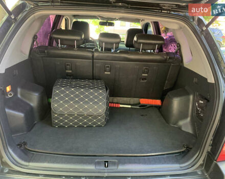 Черный Хендай Туксон, объемом двигателя 1.98 л и пробегом 232 тыс. км за 9100 $, фото 7 на Automoto.ua