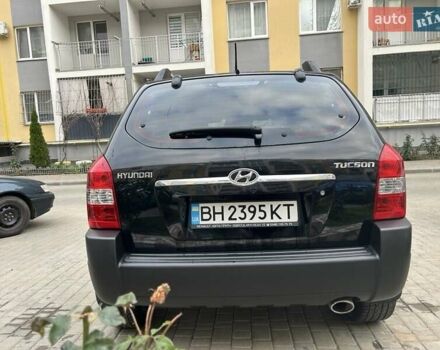 Черный Хендай Туксон, объемом двигателя 1.98 л и пробегом 147 тыс. км за 8000 $, фото 34 на Automoto.ua